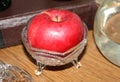 Closeup of an apple in a crystal bowl