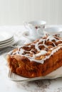 Closeup apple fritter loaf cake with icing sugar