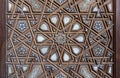 Closeup of arabesque ornaments of an old aged decorated wooden door, Cairo, Egypt