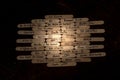 a close up of an array of small wooden sticks with names on them