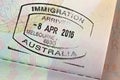 Closeup of Arrival entry stamp on passport for immigration trave Royalty Free Stock Photo