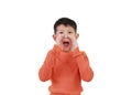Closeup Asian boy shouting straight at camera isolated on white background Royalty Free Stock Photo