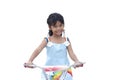 Closeup Asian little girl riding plays a bicycle having fun on white background.