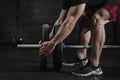 Closeup of athlete preparing for lifting weight at crossfit gym. Barbell magnesia protection. Practicing functional training p Royalty Free Stock Photo