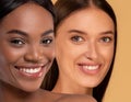 Closeup of attractive multiracial young women smiling at camera