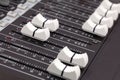 Closeup of audio mixing console. Royalty Free Stock Photo