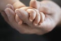 Closeup Of Baby Holding Man's Finger Royalty Free Stock Photo