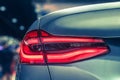 The Closeup Back Red Tail light car in Motor Show Royalty Free Stock Photo