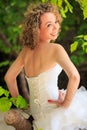 Closeup back of slim nice girl in white wedding corset Royalty Free Stock Photo