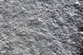 Closeup background of casting metal steel texture macro. Gray cast iron galvanized silver surface. Concept of lifeless