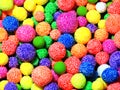 Closeup background foam plasticine multicolored rolled airy balls
