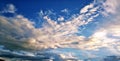 Closeup background and texture of bright blue sky and cotton clouds with sun lights on afternoon summer Royalty Free Stock Photo