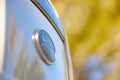 Closeup of a badge on the the land rover