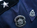 Closeup of the badge of Malaysia Police officer