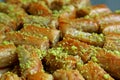 Closeup Baklava Pastries Topped with Chopped Pistachio Nuts with Selective Focus Royalty Free Stock Photo