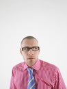Closeup Of Bald Man In Glasses Looking To His Side Royalty Free Stock Photo