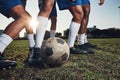 Closeup, ball and soccer with men, game and fitness with sports, competition and workout goals. Zoom, football and Royalty Free Stock Photo