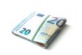 Banknotes bundle of twenty euros money on white background