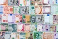 Closeup on banknotes collection from all around world Royalty Free Stock Photo