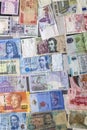 Closeup on banknotes collection from all around world Royalty Free Stock Photo