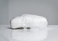 Bar of soap with soap suds Royalty Free Stock Photo