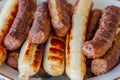 Closeup barbeque sausages on white plate Royalty Free Stock Photo