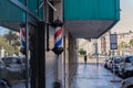 Closeup of a barber's pole, the traditional sign used by barbers