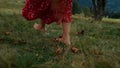 Bare woman feet walking on green grass close up. Unknown girl stepping on meadow Royalty Free Stock Photo