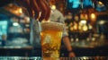 A closeup of a bartender pouring a refreshing pint of a crisp zeroalcohol pilsner