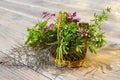 Closeup of a basket with healing herbs.