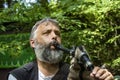 Closeup of bearded bagpiper playing his instrument at Oklahoma Renassiance Festival Muskogee Oklahoma USA 5 13 2018 Royalty Free Stock Photo