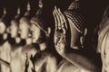 Closeup beautiful Buddha hand statue beautiful culture of Asian calm and peaceful in Thailand mono color tone photography