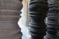 Closeup of beautiful detailed stone pillars in ancient temple ruins of angkor wat, famous khmer city in cambodia