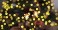 Closeup of beautiful female and man hands holding two stick of holiday sparkler burning isolated at blurry Christmas Royalty Free Stock Photo