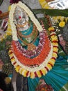 Closeup of beautiful goddess Vara Mahalakshmi decoration with flowers, fruits