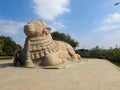 Closeup of beautiful huge or big Lord Shiva Vehicle Nandi, Basava in a blue sky background