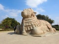 Closeup of beautiful huge or big Lord Shiva Vehicle Nandi, Basava in a blue sky background