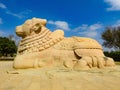 Closeup of beautiful huge or big Lord Shiva Vehicle Nandi, Basava in a blue sky background