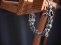 Closeup of a beautiful silver bracelet with decorations