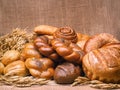 Closeup of a beautiful still-life from bread, pastry products wi Royalty Free Stock Photo