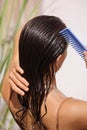 Closeup Of Beautiful Woman Hairbrushing With Comb At the Street Royalty Free Stock Photo