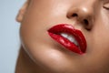 Closeup Beautiful Woman Lips With Red Lipstick On. Beauty Makeup
