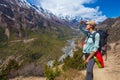 Closeup Beautiful Woman Traveler Backpacker Mountains Path.Young Girl Looks Horizon Take Rest.North Summer Snow