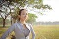 Closeup beautiful young woman face before running in the park at  morning Royalty Free Stock Photo