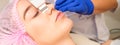 Closeup of beautiful young woman receiving ultrasound facial exfoliation and cavitation facial peeling with ultrasonic Royalty Free Stock Photo