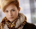 Closeup of beautiful young woman in scarf