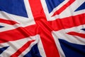 Closeup beautifully wavingof UK British flag Union Jack flag background