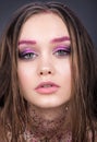 Closeup beauty portrait of beautiful girl teenager. Bright makeup with glitter