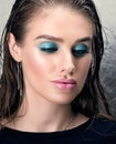 Closeup beauty portrait of beautiful young woman with bright makeup for eyes and lips Royalty Free Stock Photo