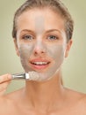 Closeup beauty portrait woman applying facial mask Royalty Free Stock Photo